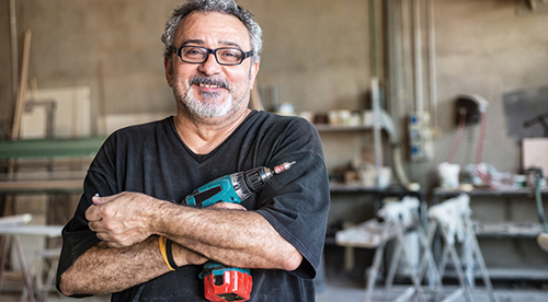 Senior man with drill - Employment section in Seniors' Director Senior man with drill - Employment section in Seniors' Directory