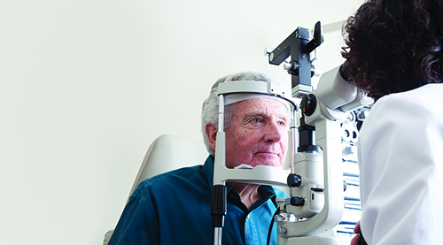Optometrist with patient